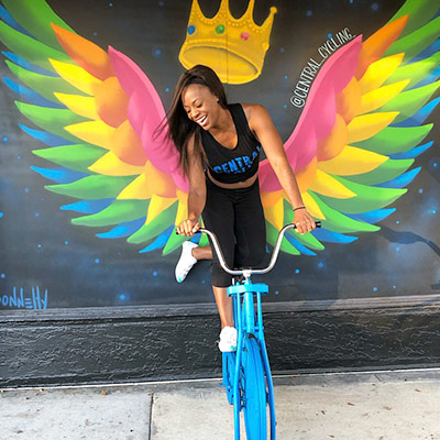 Stephanie Brewster – Central Cycling spin studio athletes standing in front of Central Cycling downtown St Pete location