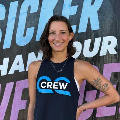 Kylie M spin studio athletes standing in front of Central Cycling downtown St Pete location