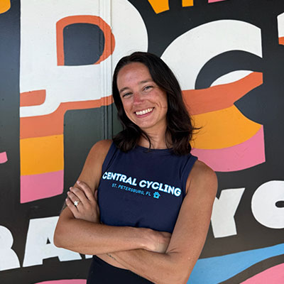 Mimi spin studio athletes standing in front of Central Cycling downtown St Pete location